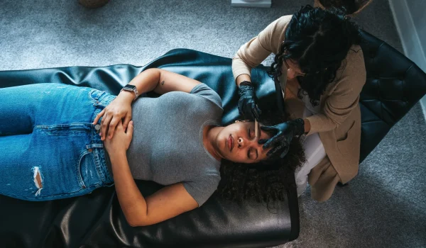 Woman-receiving-brows-treatment-at-home